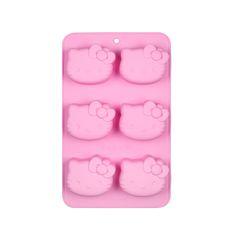 an ice tray with four hello kitty shaped chocolate molds in the shape of hearts