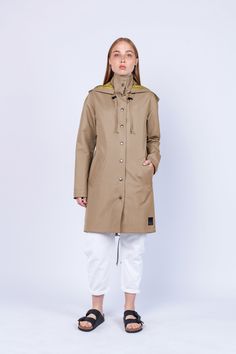 "Women's Beige Fashion Unique Raincoat ''GUATEMALA\" 885 Handmade in Lithuania.  Enjoy functional and stylish raincoat. This raincoat is waterproof and wind-resistant to keep you warm and dry.  Raincoat is with a hood and has front pockets with buttons. Color: beige Material: 100% Polyester, coated with PU Lining: 100% Rayon, bronze color Size: XS, S, M, L, XL, XXL Precise raincoat size (cm/inch) You can find in photos area." Stylish Raincoats, Beige Fashion, Working Women, Fashion Unique, Working Woman, Womens Jackets, Etsy Fashion, Bronze Color, Guatemala