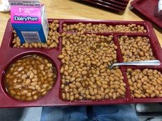 the tray is full of beans and milk