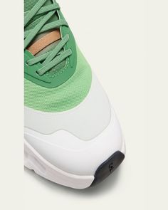 Loewe x On Cloudtilt running sneakers in colorblock polyester and spandex    0.17 in / 5 mm flatform heel    Reinforced round toe     Elastic laceup vamp    Screenprinted Anagram and On logo    Pulltab on backstay     Embellished midsole     Lightweight, flexible EVA outsole    Imported Green Sneakers With Boost Midsole For Jogging, Modern Green Nylon Sneakers, Green Functional Sneakers With Boost Midsole, Functional Green Sneakers With Boost Midsole, Green Running Shoes With Contrast Sole For Jogging, Green Low-top Chunky Sneakers With Rubber Sole, Green High-top Chunky Sneakers With Rubber Sole, Functional Green Lace-up High-top Sneakers, Green Running Shoes With Branded Insole And Medium Fit