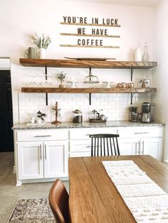 the kitchen is clean and ready to be used as a coffee shop or office space