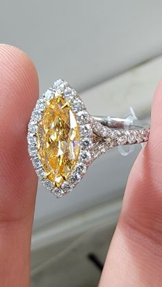 Beautiful Marquise Orange diamond set in a delicate Platinum ring with 0.62ct of rounds The diamond faces up predominantly orange Expensive Purses, Orange Diamond, Diamond Face, Platinum Ring, Diamond Set, Buying Jewelry, Conflict Free Diamonds, Online Design, Orange Yellow