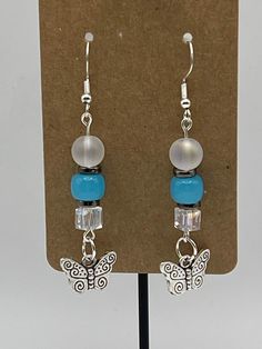 Handmade Earrings - Butterfly Series Each piece is meticulously handcrafted using craft wire, hypoallergenic earring hooks, and premium beads including crystal, glass, wood, ceramic, acrylic, resin, stone, and silicone beads. Care Instructions: Avoid moisture. Remove prior to bathing, showering, swimming, or exercising. Avoid allowing the item to fold when storing.  Shipping Information: Your items will be shipped within 1-2 business days once payment is received. Shipping within the US is via first class mail or you may choose to upgrade to Priority Mail for a small fee. First class shipping is free for orders over $35. Each item is carefully wrapped and packaged for safety during transit. Returns & Exchanges: As this is a wearable item, I do not accept returns or exchanges on this item. Hypoallergenic Czech Glass Earrings For Gift, Adjustable Nickel Free Czech Glass Beaded Earrings, Hypoallergenic Czech Glass Drop Earrings, Nickel-free Czech Glass Earrings For Jewelry Making, Hypoallergenic Czech Glass Dangle Crystal Earrings, Hypoallergenic Czech Glass Dangle Earrings, Czech Glass Beaded Drop Earrings, Nickel-free Czech Glass Crystal Earrings As Gift, Nickel-free Czech Glass Crystal Earrings For Gift