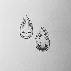 two black and white drawings of fire with eyes