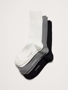 Comfortably knit from a soft cotton blend, these cozy socks will carry you through the season with ease.  Set of 3 pairs.  Fits men's shoe sizes 8-12. Trouser Socks, Cozy Socks, Men's Shoe, Heather White, Men Shoes Size, Winter Sale, Mens Fitness, Banana Republic, White And Black