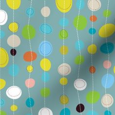 a blue background with multicolored circles and lines on the bottom, along with white dots