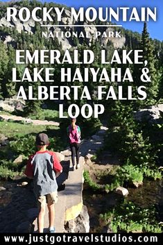 two people hiking up a trail with the text rocky mountain national park emerald lake, lake ha