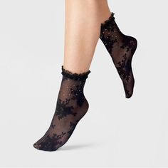 Add elegant style to your everyday looks with the Jewel Floral Sheer Anklet Socks With Ruffle from A New Day™. These black socks feature a sheer construction with floral knit detailing for a textured appeal. Adorned with rhinestones, these anklet socks showcase ruffled trim and banded cuffs for an eye-catching look. Plus, they're made from soft and stretchy fabric for comfortable wear. A New Day™: Style that goes wherever you do. Elegant Black Socks For Spring, Glitter Socks Outfit, Black Ruffle Socks, Fashion Outfits Simple, Alex Core, Black Anklet, Outfits Simple, Edgy Looks, College Essentials