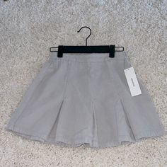 Grey/Gris Corduroy Skirt Urban Outfitters (Never Worn) Cotton Mini Pleated Skirt For School, Cotton Pleated Mini Skirt For School, Preppy Cotton Mini Tennis Skirt, Preppy Mini Cotton Tennis Skirt, Pleated Cotton Mini Skirt For School, Cotton Pleated Mini Skirt For School Uniform, School Pleated Cotton Mini Skirt, School-appropriate Cotton Pleated Mini Skirt, School Mini Pleated Cotton Skirt