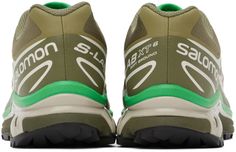 The Salomon Khaki & Green XT-6 sneaker is the perfect outdoor-inspired shoe for your active lifestyle. Featuring lightweight SensiFit mesh and a durable bonded trim throughout, these kicks were made for comfortably exploring nature-filled feeds. The Quicklace closure and padded collar provide a custom locked-in fit, while the OrthoLite insole and mesh lining keep feet fresh all day. With the Agile Chassis rubber midsole and grippy Contagrip outsole, you'll feel steady on any terrain. In trendy khaki and green tones made to match your hike and explore Instagram aesthetic, these Salomon sneakers allow you to soak up the sights in sustainable style. Green High-top Running Shoes With Laces, Functional Green Sneakers With Laces, Functional Green Running Shoes For Streetwear, Green Lace-up Trail Running Shoes For Streetwear, Sporty Green Fade-resistant Sneakers, Green High-top Running Shoes, Green High-top Running Shoes For Light Sports, Green Low-top Trail Running Shoes For Light Sports, Green Running Shoes With Laces For Sports