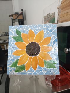 Stained Glass Mosaic Sunflower on a ceramic tile. Flower Glass Mosaic, Mosaic Sunflower, Sunflower Mosaic, Butterfly Mosaic, Mosaic Stepping Stones, Mosaic Art Projects, Mosaic Flowers, Broken China, Mosaic Ideas