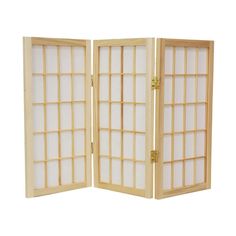 a room divider made out of wood and white glass panels with gold hardware on each side