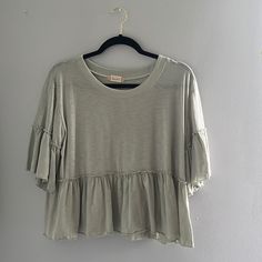 Never Worn Before, Can Fit Medium/Small Well Country T Shirts For Women, Spring Ruffle Sleeve Top For Layering, Ruffle Sleeve Tops For Layering, Crew Neck Shirt With Ruffles For Spring, Ruffle Sleeve Tops For Summer Layering, Casual Crew Neck Top With Ruffle Hem, Casual Ruffle Hem Top With Relaxed Fit, Casual Tops With Ruffle Hem And Relaxed Fit, Casual Ruffle Hem Top For Brunch