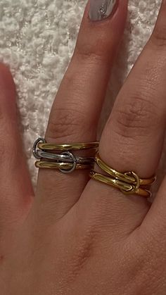 Stainless Steel Interlocking Ring Stack with my Mix Metal Interlocking Ring:  https://www.etsy.com/listing/1756335424/gold-multi-link-connected-ring-silver?click_key=aa0e293967045c4713dfd0615cfab99a7a5a2c85%3A1756335424&click_sum=b8266659&ref=shop_home_active_8&pro=1 Offering in 4 different sizes Handmade by me Materials: Gold Plated Stainless Steel Care Instructions: This Metal will not tarnish. You can treat it and wear it the way you would with Real Gold. You can Swim, workout, and go about your daily routine. Mixed Metal Ring Stack, Swim Workout, Mixed Metal Ring, Interlocking Ring, Mixed Metal Rings, Ring Stack, Metal Ring, Dream Ring, Mixed Metals