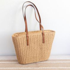 IN STOCK FAST SHIPPING FROM LOS ANGELES Large fashion straw woven tote bag perfect for all occasions. Its timeless design makes it the perfect everyday accessory, providing a fashionable and luxurious touch to any ensemble. Size: 44cm wide x 28cm tall (17in x 11in) Designer Style ID: 8498 Country Style Straw Woven Tote Bag, Vintage Vibes, Summer Bag, Everyday Shoulder Bag, Beach Bag Rafia Bag, Straw Weaving, Woven Tote Bag, Market Tote, Products Ideas, Jute Bags, Everyday Accessories, I Love Fashion, Large Fashion