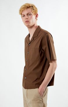 Unwind in style with PacSun's Solid Oversized Camp Shirt. Boasting a laid-back vibe with its collared neckline, short sleeves, and relaxed fit, this shirt is perfect for casual outings. Complete with a left chest pocket for added convenience, it's a versatile wardrobe staple for easy, breezy days.


	Collared neckline
	Short sleeves
	Oversized fit
	Button closures
	Left chest pocket
	69% cotton, 26% nylon, 5% spandex
	Machine washable
	Model is wearing size medium
	Model Measurements: 6’3”  Height, 28” Waist, 33.5” Hips Versatile Wardrobe, Camp Shirt, Easy Breezy, Camping Shirt, Summer Kids, Shirt Price, Exclusive Collection, Model Measurements, Pacsun