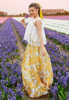 It’s all about flower power in this bright, yellow maxi skirt boasting a soft chiffon fabric and floral print.      - Floral pattern  - Elastic waist provides stretch  - Asymmetric hem  - Lined  - 100% Polyester  - Hand wash      Size(cm) Length  Waist  XS-S            100-105      58-68  M-L               100-105     70-80  XL-XXL           100-105      82-92  Size(inch) Length  Waist  XS/S            39.5-41.5      23-26.5  M-L              39.5-41.5      27.5-31.5  XL-XXL          39.5-41.5 Flower Skirts, Yellow Maxi Skirts, Flower Season, Chiffon Maxi Skirt, Yellow Maxi, Lace Sleeveless Top, Flower Skirt, Vintage Skirts, Chiffon Maxi