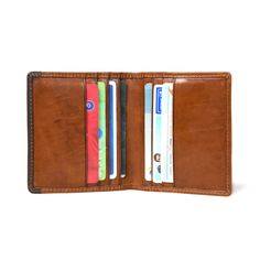 A sleek and practical accessory designed to streamline your everyday carry. Crafted with meticulous attention to detail, this card holder combines functionality with understated elegance, making it the perfect choice for both business and casual use. Handcrafted from full-grain buffalo leather, this card holder offers durability to withstand the rigors of daily life. The rich, warm hue adds a touch of timeless style to your ensemble, making it a versatile addition to your accessories collection. Versatile Leather Card Holder With Interior Slots, Business Trifold Wallet With Card Slots, Trifold Card Holder With Coin Pocket For Travel, Modern Trifold Card Holder For Daily Use, Business Trifold Wallet With Interior Card Slots, Modern Bifold Card Holder With Interior Slots, Trifold Wallets With Interior Card Slots For Everyday Use, Classic Rectangular Wallets With Interior Card Slots, Classic Rectangular Card Holder With Interior Slots