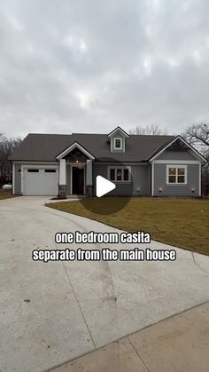 a gray house with the words, one bedroom castata separate from the main house