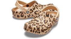 Original. Versatile. Comfortable.The iconic clog that started a comfort revolution around the world, now with fun new graphics, including elegant and tropical florals and leopard print! Crocs Classic Clogs offer lightweight Iconic Crocs Comfort™, a print for every personality, and an ongoing invitation to be comfortable in your own shoes.  Classic Printed Clog Details:    Incredibly light and fun to wear  Ventilation ports add breathability and help shed water and debris  Easy to clean and quick Summer Slip-resistant Clogs, Tropical Florals, Crocs Classic Clogs, Shoes Classic, Tropical Floral, Strap Heels, Free Shopping, Black Floral, Clogs