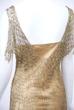 For Sale on 1stDibs - Donna Karan metallic gold crochet lace dress with a complementary silk charmeuse slip dress underneath. The crochet dress skims the body and features a Flapper Dress Pattern, Gold Crochet, Silk Evening Dress, Backless Gown, Bead Knit, Deep V Dress, Evening Skirts, Sequin Cardigan, Crochet Lace Dress