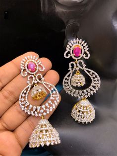 These Chandbali Long Jhumka Earrings offer impeccable style, featuring a unique Indian design with sparkling CZ stone accents, perfect for the next Bollywood or Indian-Pakistani-style party.