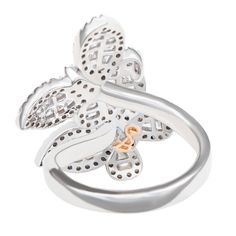 With elegance and subtlety, this Suzy Levian butterfly collection creation has become an icon of class, luxury and style. Let your creative side shine through with this whimsical double butterfly ring featuring white round and baguette shape cubic zirconia, hand set in sterling silver. This ring is designed by Suzy Levian with a message. By creating jewelry that is beautiful inside and out, Suzy Levian 's message is revealed through a hidden stone set inside the shank of this ring to empower wom Sl Logo, Double Butterfly, Butterfly Collection, Butterfly Ring, Beautiful Inside And Out, Creating Jewelry, Stone Settings, Women Empowerment, Cubic Zirconia