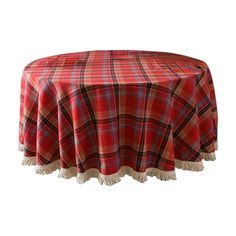 a red plaid tablecloth with fringes on it and an oval shaped table cloth