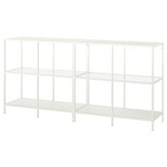 a white shelf with three shelves on each side