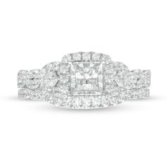 Celebrate your love with the elegant design of this princess-cut diamond twist bridal set. Crafted in 10K white gold The engagement ring showcases a 1/3 ct. princess-cut diamond - artfully set to enhance size and sparkle - wrapped in a cushion-shaped frame of diamonds. Shimmering princess-cut diamonds flank the center while the twist split ribbons of the split shank glisten with diamonds. Underneath, a pair of bezel-set diamonds adorn the 10K rose gold gallery. On your wedding day, the contoured Wedding Square-cut Platinum Diamond Ring, Wedding Square Cut Platinum Diamond Ring, Square Cut Platinum Wedding Diamond Ring, Diamond White Princess Cut Bridal Sets, Princess Cut Cubic Zirconia Bridal Sets, Cubic Zirconia Princess Cut Bridal Sets, Diamond White Bridal Sets With Princess Cut Diamonds, White Cubic Zirconia Bridal Set Princess Cut, Cubic Zirconia Bridal Sets Princess Cut