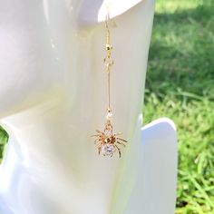 👂PRODUCT DETAILS Spider Earrings by ELEVEN11DREAM - Material:  14k gold plated - Size: Length 2.36in. /Drop Length 1.77 in. /width0.59in.     Length 6cm /Drop Length 4.5cm /width1.5cm - Sold in pairs 🎈SHIPPING - All orders will be shipped within 1-3 business days after the order has been received - Ship all orders via USPS First-Class Mail - FREE SHIPPING for all USA domestic orders 💖PLEASE READ THE PRODUCT DESCRIPTION - All products are made by my hand with love and care in my studio - All products are nicely packaged in a protected clear box or bag to avoid damage - Keep your jewelry away from water or any liquid chemicals to avoid discoloration (for example, swimming or bathing) - Safely store your jewelry in a jewelry box or airlock bag 🔴RETURNS, REFUNDS&EXCHANGES If you would like Gold Dangle Halloween Jewelry, Halloween Gold Dangle Jewelry, Gold Dangle Jewelry For Halloween, Gold Novelty Earrings For Halloween, Gold Novelty Jewelry For Party, Novelty Drop Earrings For Party, Hypoallergenic Drop Earrings For Halloween, Novelty Hypoallergenic Party Earrings, Novelty Hypoallergenic Earrings For Party