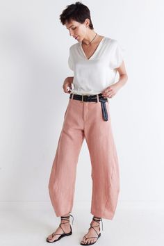 These pants combine the airy comfort of linen with a modern silhouette, offering a stylish option for warmer weather. With their tailored fit and breathable fabric, these pants effortlessly blend sophistication with laid-back charm, making them the perfect wardrobe staple. Tailored fit and tapered leg Elasticized waist with hook-and-bar closure Relaxed leg Breathable fabric Loose Linen Pants, Perfect Wardrobe, Linen Pants, Wardrobe Staples, Latest Fashion, Breathable Fabric, Fashion Forward, Pants