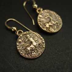 Handmade antiqued dainty and light birthday gift zodiac Centaur Sagittarius earrings.Sagittarius are: Generous, Idealistic, Great Sense of Humor.Handmade antiqued bronze coin charm with the zodiac sign of Sagittarius for people born between November 23 to December 21.The concept of the zodiac originated in Babylonian astrology, and was later influenced by Hellenistic culture. According to astrology, celestial phenomena relate to human activity on the principle of "as above, so below", so that th Zodiac Sign Brass Jewelry Gift, Brass Zodiac Sign Jewelry Gift, Silver Zodiac Sign Earrings As Gift, Silver Zodiac Sign Earrings For Gift, Gold Zodiac Sign Earrings Gift, Silver Earrings With Zodiac Sign For Gift, Sagittarius Earrings, Centaur Sagittarius, Tarpon Springs