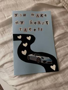 a card that says you make my heart race with a car driving down the road