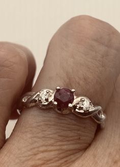 Unusual deep toned ruby sterling filigree setting handmade  size 8 Can be resized. My jeweler charges a $20 fee All rings are shipped in a nice gift box.   Check out our over a THOUSAND great reviews Engraving is $4 per letter and is not always perfect depending on the piece. It can take a few days if the jeweler is busy. This is payable to Paypal Judithsltd@gmail.com Unique Hallmarked Ruby Promise Ring, Unique Hallmarked Ruby Ring As A Gift, Unique Hallmarked Ruby Ring Gift, Unique Sterling Silver Ruby Ring For Anniversary, Silver Ruby Ring With Prong Setting As Gift, Silver Ruby Ring With Accent Stones As A Gift, Silver Ruby Ring With Accent Stones For Gift, Unique Ruby Round Ring As Birthstone, Unique Round Ruby Birthstone Ring