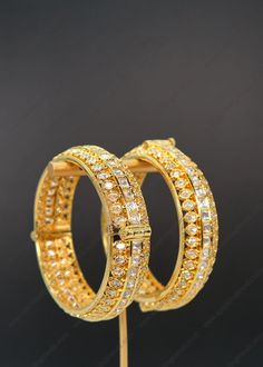 "Premium Quality Tyaani Kundan Openable Kada. You can Pair this with your stunning saree look or with any Ethnic outfit. Openable Kada - You can go one size up or down. Size: 2.4 ( Diameter 5.8)  Width: Approx. 1/2\" Screw Opening Comes 2 in a set 1 Gram Gold plated on high-quality brass as the base metal. *Color may vary slightly due to light condition & photography. Jewelry Care:  Keep away from moisture. Allow perfumes and lotion to dry before wearing. Store in jewelry pouch. Clean only with soft lint-free cloth." Kundan Kada, Bangles Bridal, Photography Jewelry, Gold Plated Bangles, Bangles Indian, Ethnic Outfits, Wedding Jewelry Bracelets, Wedding Bracelets, Saree Look