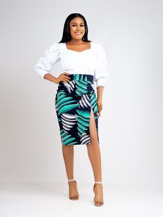 Stand out in this eye-catching soraya skirt. Step into this slim fit pencil skirt designed with a front slit and back zipper. Featuring a comfortable waistband, this printed skirt is carefully crafted from 100% Ankara wax cotton. Its as flattering as it is comfy. Description 100% Cotton African Print Wax Front slit Back invisible zipper Fully lined for added comfort 2.5 inches waist band Medium Length of top is 26 inches Made in Cameroon Fabric from Benin Care instructions Hand wash cold Hang to Straight Skirts Designs, Kitenge Skirts Designs, Ankara Skirts Designs, Chitenge Skirts, Straight Skirt Outfits, Chitenge Designs, Kitenge Outfits, African Pencil Skirt, Ankara Pencil Skirt