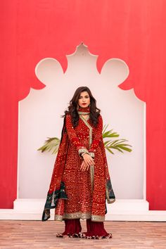 Elevate your style with our Red Chiffon Chunri Shalwar Kameez. This angharka-style suit features intricate embroidery on the bodice, neckline, daman, and sleeves, adding a touch of elegance. The golden kamdani chan work on the dupatta and kameez adds a shimmering allure. Complete the look with a matching red chunri dupatta and crushed shamoz silk sharara. 3-piece suit Ready-to-wear Red Salwar Kameez With Mirror Work, Anarkali Style Red Sharara With Dabka, Red Unstitched Designer Suit For Transitional Season, Transitional Red Designer Unstitched Suit, Designer Red Anarkali Set With Dabka Embroidery, Red Designer Dabka Anarkali Set, Red Georgette Anarkali Set With Dabka, Red Unstitched Suit With Cutdana In Straight Kurta Style, Red Anarkali Set With Dabka For Designer Wear