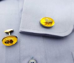 Tateossian Bumble Bee cufflinks are simply stunning. Set in resin, they are made from real bees. Gunmental finish for the metal parts and made in London. $250 on our website. Bee Cufflinks, Geek Chic Fashion, Bee Wedding, Money Clips, Tie Bar, Geek Chic, Suit Up, Queen Bee, Queen Bees