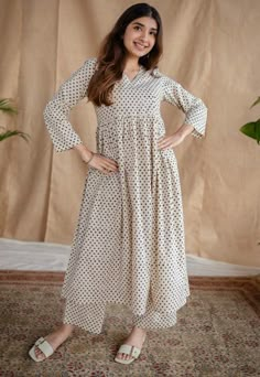 Beige Fakira Handblock Printed Mul Cotton A Line Kurta Model height is 5'3" and is wearing a size S. Silk Kurtas, Rings Indian, Kalamkari Fabric, Pakistani Fancy Dresses, A Line Kurta, Stylish Dresses For Girls, Holiday Wear, Cotton Suits