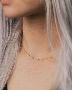 This 14K gold Saturn Chain features 1.7mm faceted bead elements. A unique, modern chain that will become a staple in your wardrobe. NECKLACE DETAILS: Length: 16 Inches & 18 Inches Millimeter: 0.90 Closure: Lobster Average Weight (g): 16" is 1.67 grams; 18" is 1.84 grams Available in 14K Yellow Gold ***These necklaces have a 4 week lead time. If you need your necklace sooner than that, please contact us prior to ordering to verify if that's possible.*** | Faceted Bead Saturn Chain Necklace In 14K Yellow Gold Ring - by Staghead Designs - Unisex Everyday Faceted Yellow Gold Jewelry, Yellow Gold Cable Chain Choker, Minimalist Yellow Gold Briolette Jewelry, Faceted Yellow Gold Jewelry In Recycled Gold, Modern Gold Necklace With Beaded Chain, Gold Faceted Jewelry For Everyday, Faceted Yellow Gold Jewelry From Recycled Gold, Yellow Gold Faceted Recycled Gold Jewelry, Elegant Faceted Jewelry In Recycled Gold