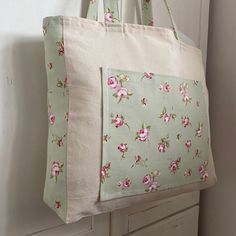 a floral bag hanging on the wall