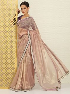 Lavender sareeSolid saree with embroidered borderHas sequinned detailThe saree comes with an unstitched blouse pieceThe blouse worn by the model might be for modelling purpose only. Check the image of the blouse piece to understand how the actual blouse piece looks like. Semi-stitched Net Saree, Pink Semi-stitched Net Saree, Semi-stitched Pink Sequin Pre-draped Saree, Purple Sequined Pre-draped Saree, Pink Embroidered Sequined Saree Fabric, Western Kurtis, Georgette Material, Solid Maxi Dress, Saree Sale