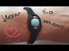 a woman's arm with a bracelet on it that says i love you to make