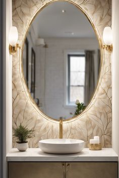 Elegant bathroom vanity with oval mirror, soft lighting, and modern sink. Tranquil Bathroom