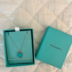 This Necklace Is Brand New From The Tiffany Blue Line And Never Been Worn. It Is Sterling Silver With The Traditional Tiffany Blue In The Heart. It Is In The Original Box That In Which It Was Purchased. Tiffany E Co Necklace, Blue Luxury Necklace For Valentine's Day, Elegant Blue Heart Necklace, Elegant Blue Necklace With Heart Charm, Elegant Blue Necklaces For Valentine's Day, Elegant Blue Necklaces With Heart Charm, Luxury Blue Heart-shaped Necklace, Elegant Blue Heart Necklace For Valentine's Day, Blue Heart-shaped Necklace For Formal Occasions