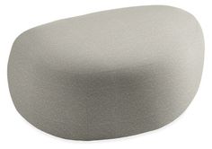 an image of a grey ottoman cushion