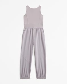 Versatile active jumpsuit in a soft synthetic mixed fabric, with elasticated waist, trendy high-neck detail, banded cuffs and side pockets. Abercrombie Kids, Mixing Fabrics, Lower Body, Dress Romper, High Neck, Girls Dresses, Rompers, Jumpsuit, Size 7