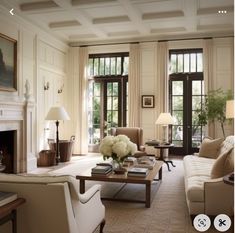 a living room filled with furniture and a fire place