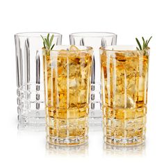 three glasses filled with different types of drinks and garnished with rosemary sprigs